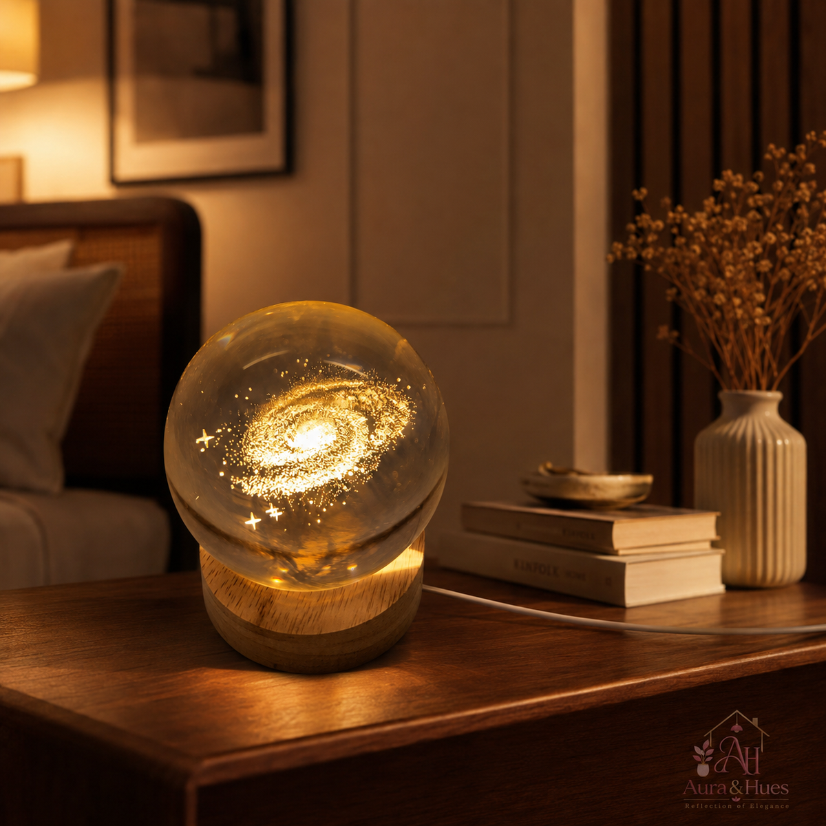 LED Crystal Ball galaxy lamp glowing in dark room on wooden table