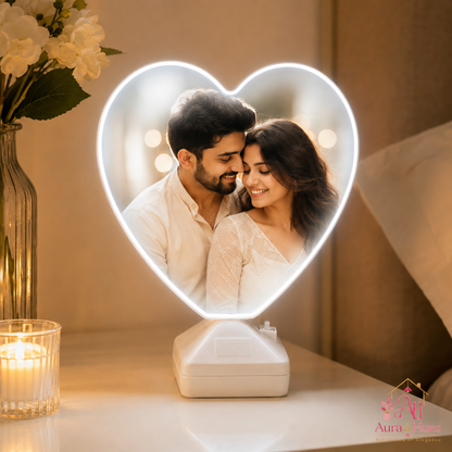 Heart Magic Mirror LED photo frame glowing with couple photo on bedside table