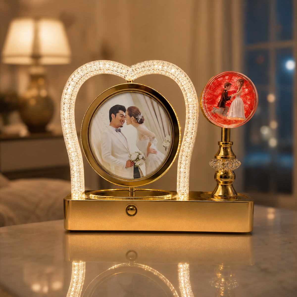 Illuminated golden heart crystal globe photo frame on table